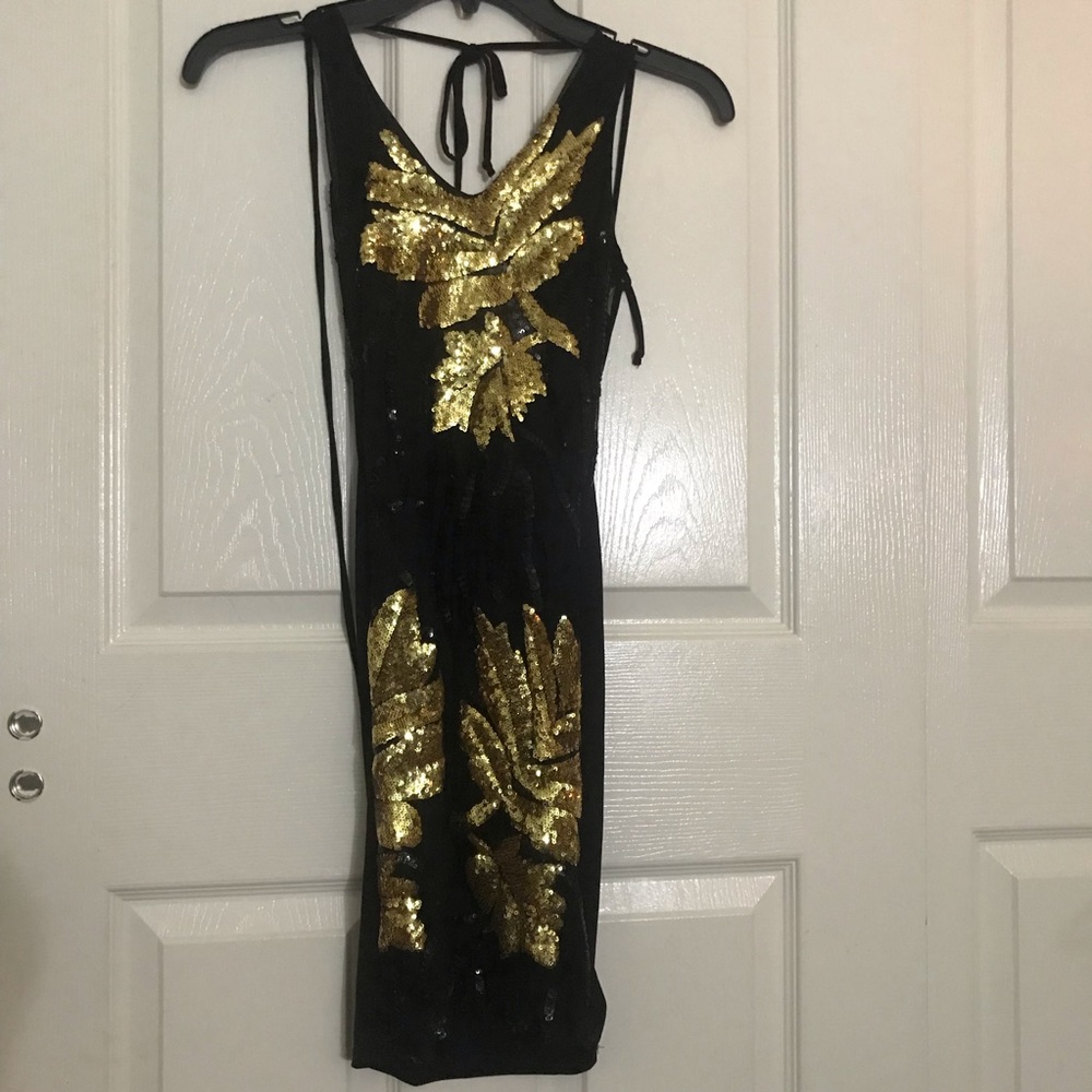 Black and yellow sequin dress